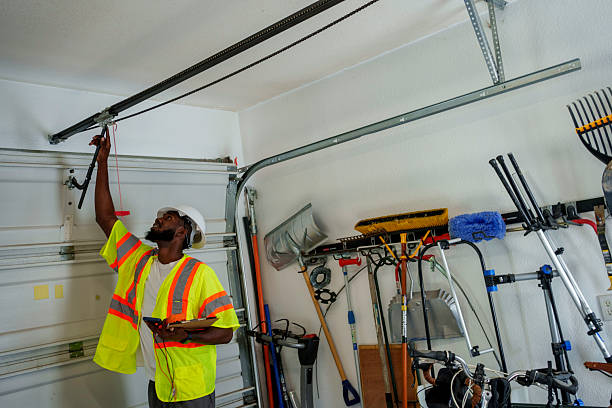 Professional Garage Door Panel Replacement technician working in Bourbon, IN